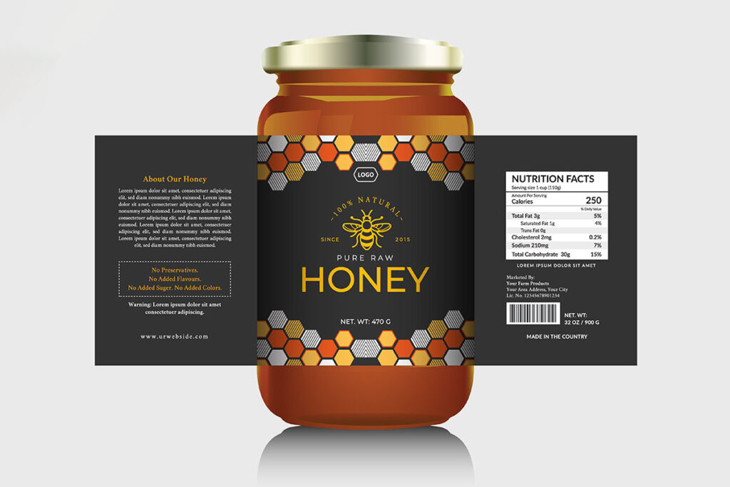 A product mockup of a glass honey jar with a black label design featuring a golden bee illustration, honeycomb patterns, and flat-lay side panels for product description and nutrition facts.